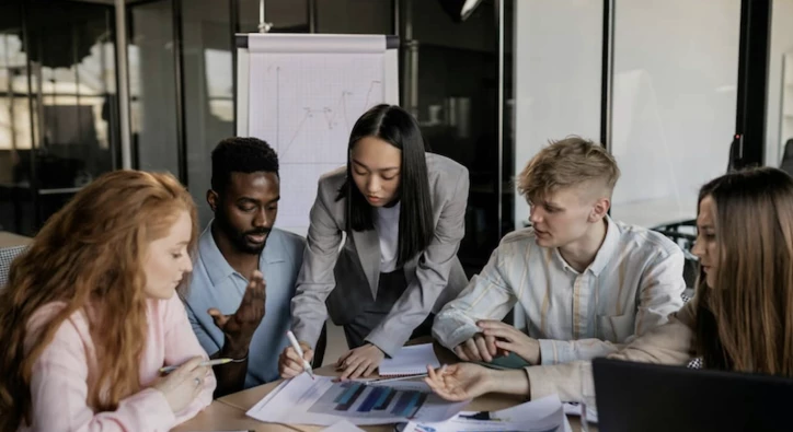 People discussing around a table