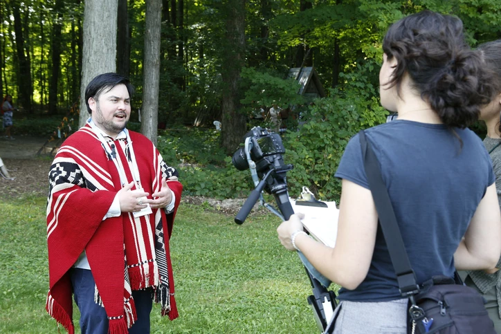 OYW crew filming delegate talking