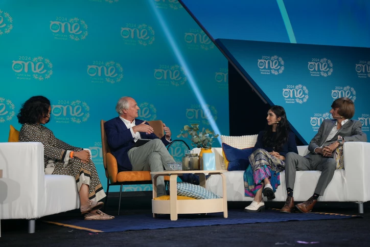 delegates on stage at the summit with paul polman